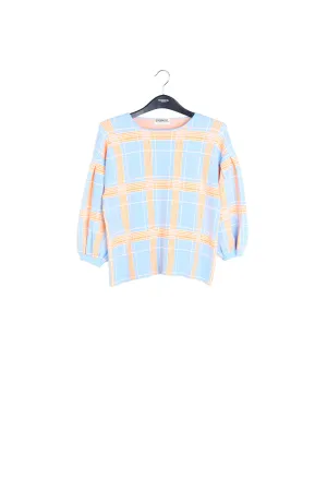 Light blue puffed sleeve knitted top with check motif
